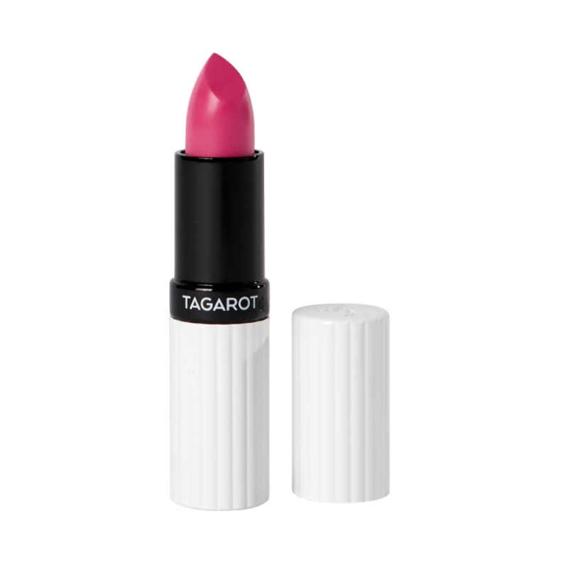 Ein geöffneter Lippenstift in Pink von UND GRETEL, Modell TAGAROT, mit weißer Hülle.