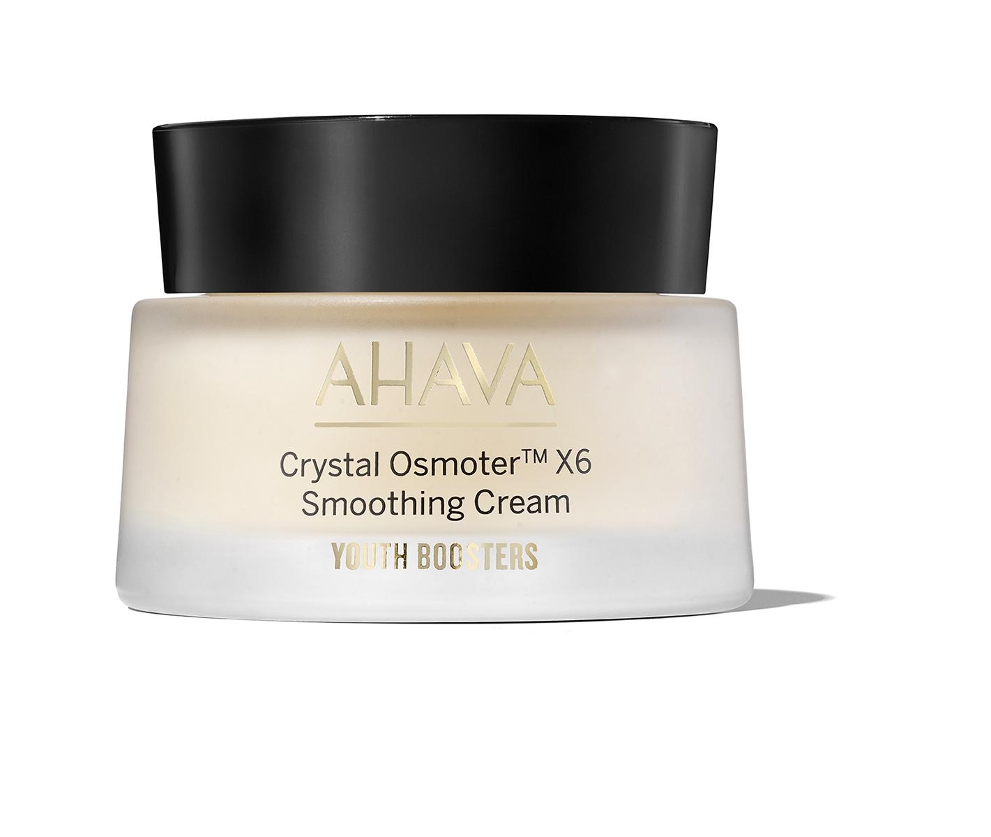 AHAVA Crystal Osmoter X6 Smoothing Cream in einem Glasbehälter mit schwarzem Deckel, Produktetikett in goldener Schrift.