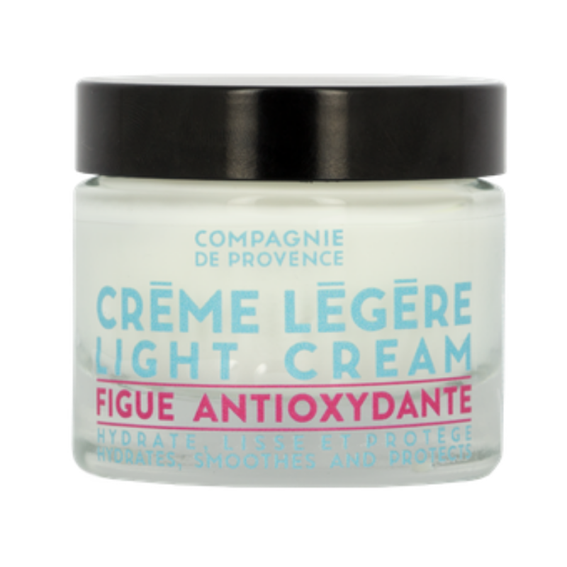 Ein Glas mit 'Crème Légère Light Cream' von Compagnie de Provence, Figue Antioxidante, auf weißem Hintergrund.