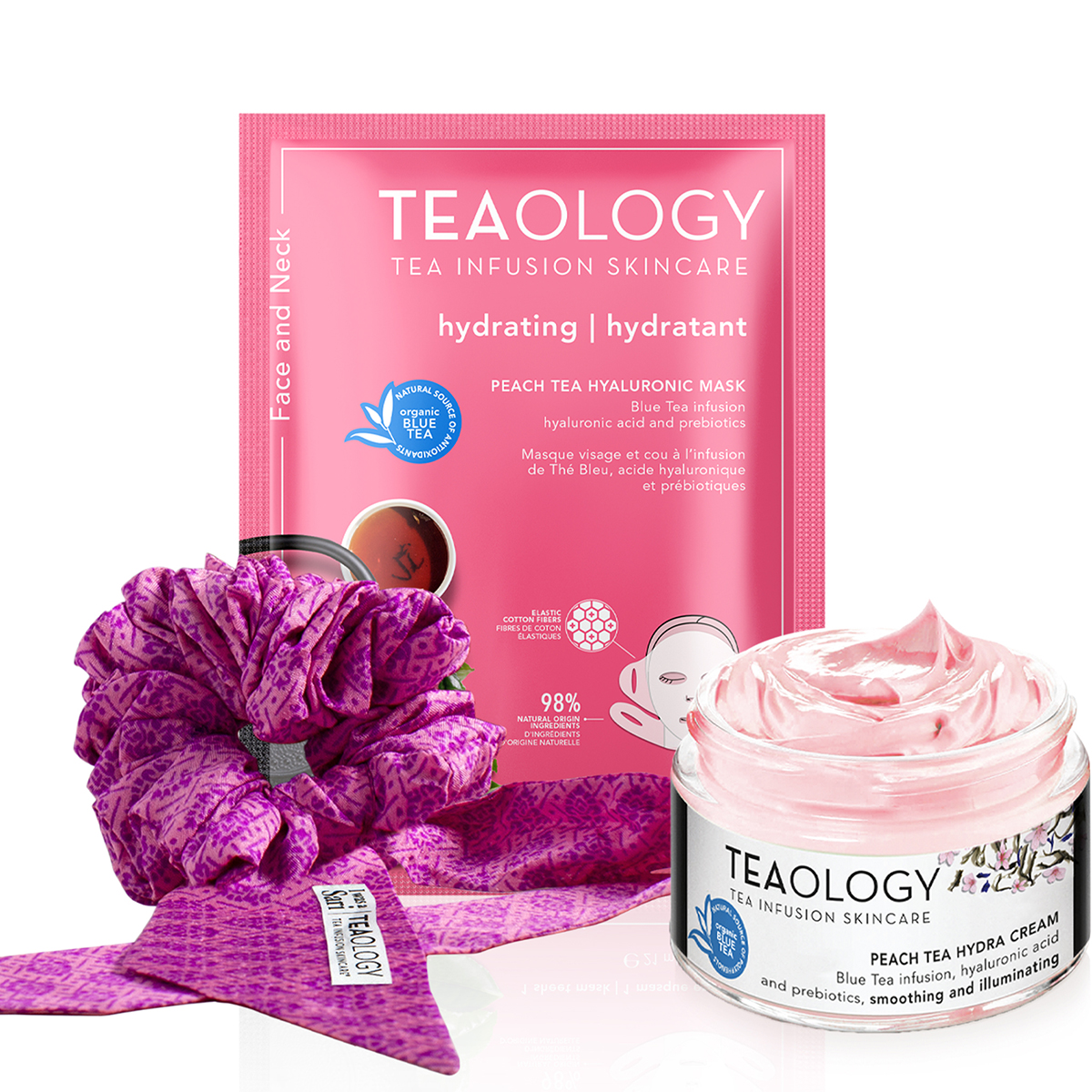 TEAOLOGY Pfirsich Tee Hyaluron Maske und Hydra Creme, lila Haarband und Stern-Deko.