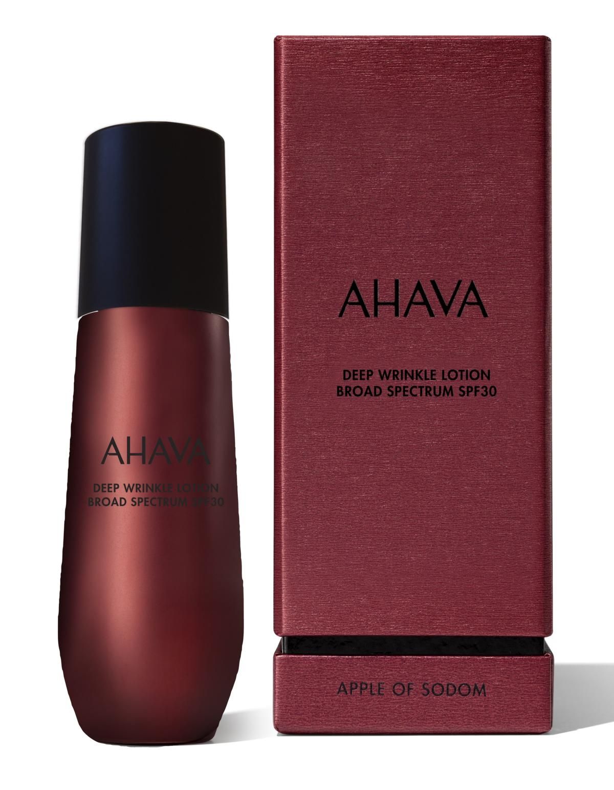 AHAVA Deep Wrinkle Lotion SPF30 in roter Flasche neben passender Verpackung.