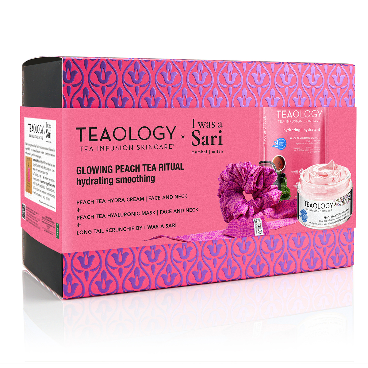 Teepflege-Set 'Glowing Peach Tea Ritual' von Teaology, enthält Creme, Maske und Haargummi, Verpackung in Pink und Schwarz.