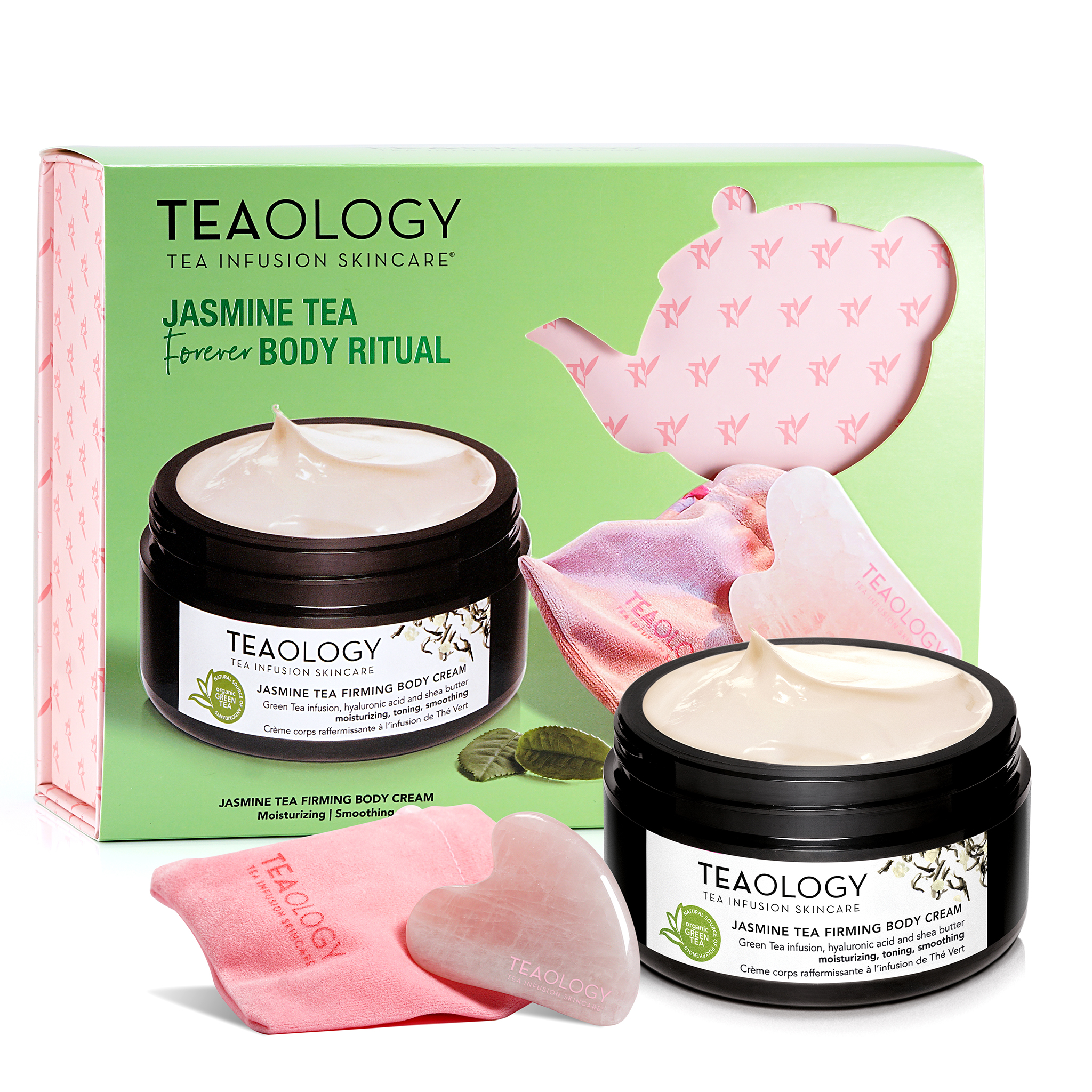 TEAOLOGY Jasmine Tea Firming Body Cream Set mit Herz-Massagestein und rosa Beutel vor Verpackung.