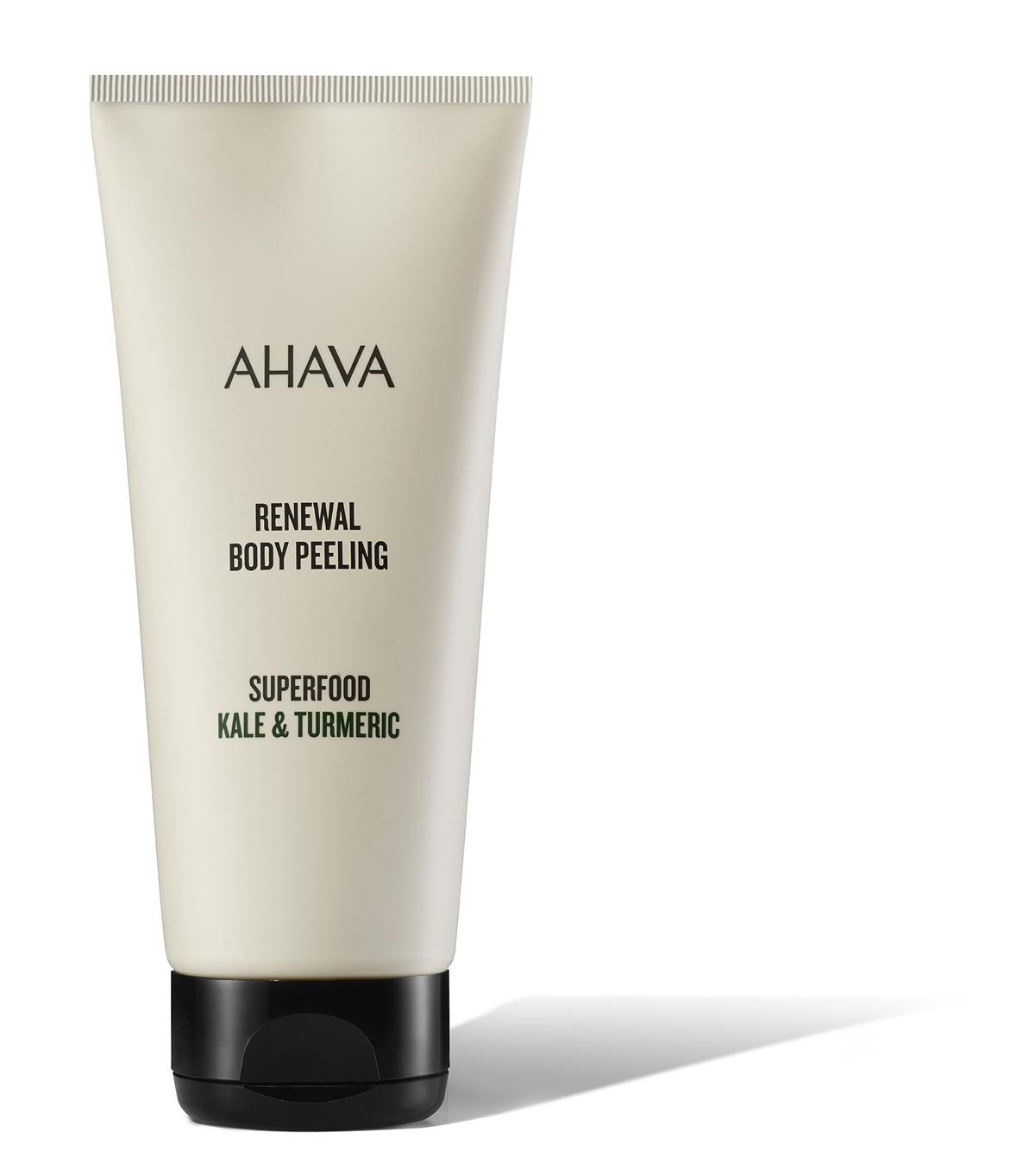 AHAVA Renewal Body Peeling Superfood Kale & Turmeric in einer weißen Tube mit schwarzem Deckel.