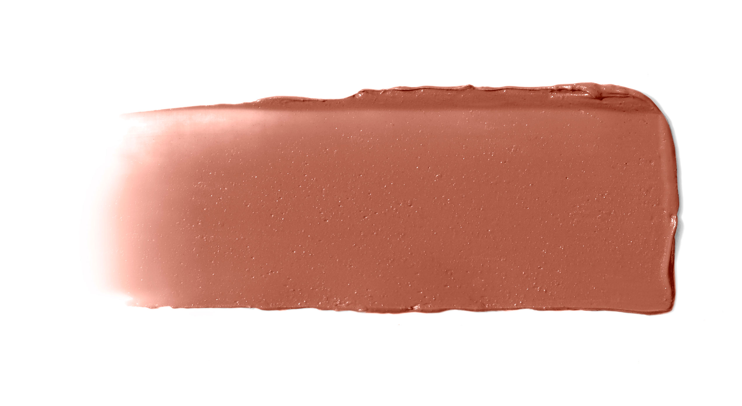 Ein Streifen rosafarbener Creme-Rouge auf weißem Hintergrund.